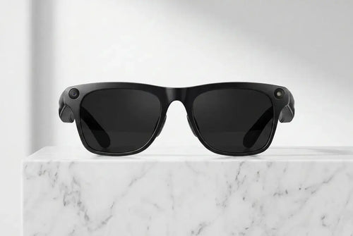 Black smart AI sunglasses with camera on a marble surface with a light gray background